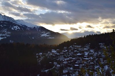 Scenic view of mountains against sky during winter