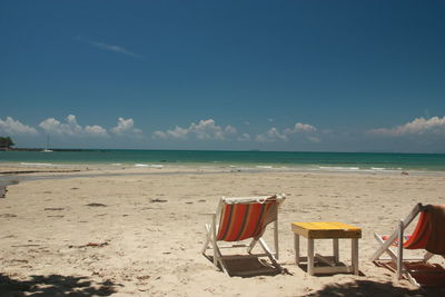 Deck chairs on beach