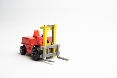 Close-up of toy car against white background