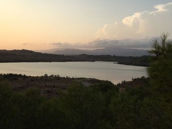 Scenic view of landscape against sky during sunset