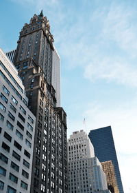 Low angle view of modern buildings against sky in city