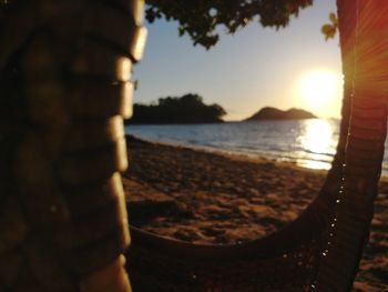 Close-up of sea during sunset