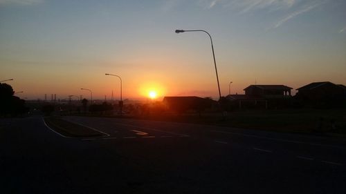 Empty road at sunset