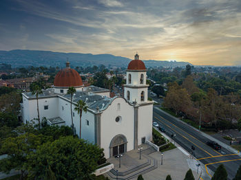 High angle view of trees and buildings against sky