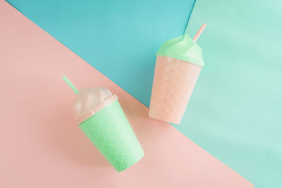 High angle view of drink on table against blue background