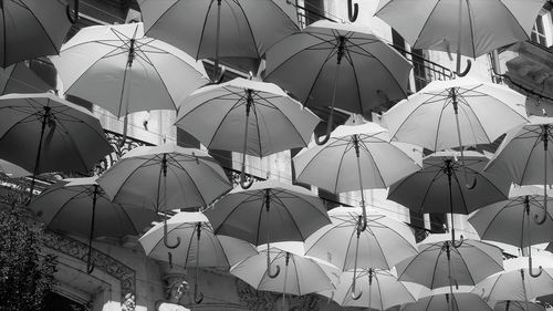 High angle view of umbrellas on wet street
