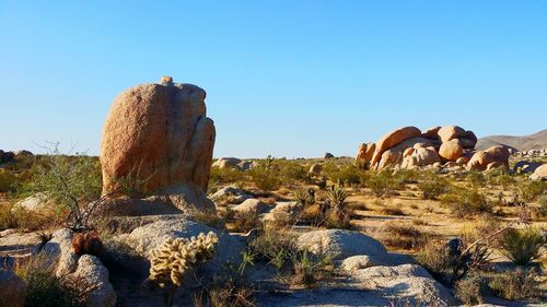 Rock formations against blue sky