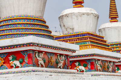 Colorful painting on a tibetan stupa at the kumbum champa ling monastery near xining, china