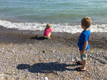 Siblings at beach