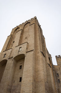 Low angle view of old building against sky