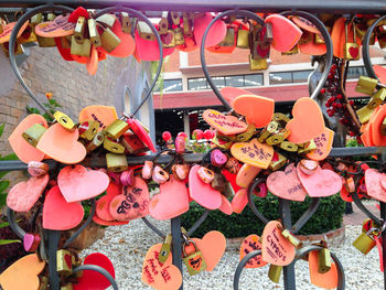 Close-up of padlocks hanging on railing