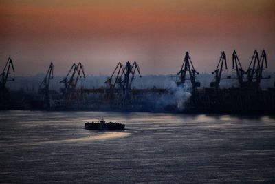 Scenic view of sea against sky during sunset