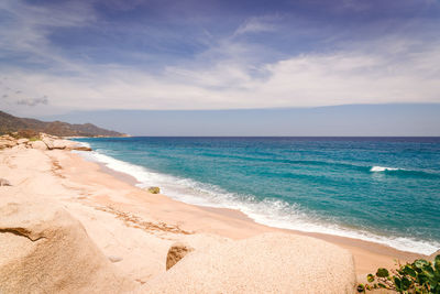 Scenic view of beach against sky