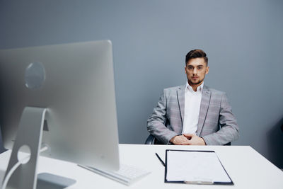 Businesswoman working at desk in office