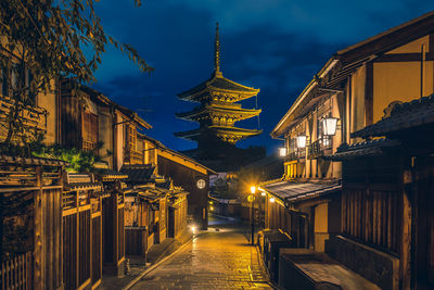 Hokan-ji temple, kyoto, japan view from illuminated street at night.
