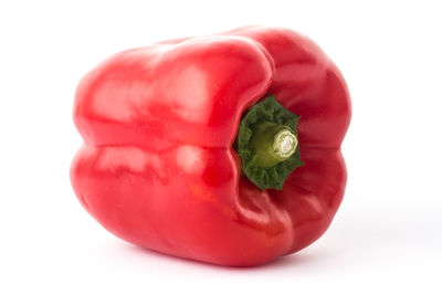 Close-up of tomatoes over white background