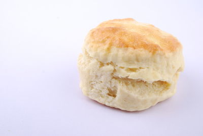 Close-up of bread against white background