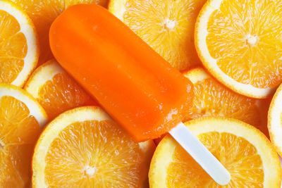 Close-up of ice cream on orange slices