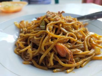 Close-up of noodles served in plate