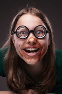 Close-up portrait of a smiling young woman