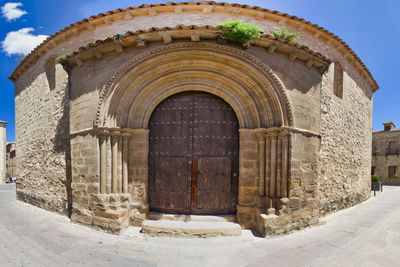 Exterior of historic building against sky