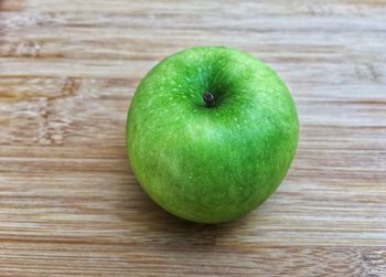 High angle view of apple on table