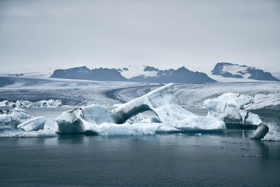 Scenic view of glacier lagoon against sky