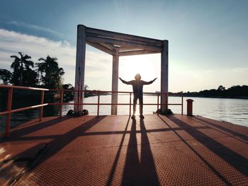 Full length of man standing on pier