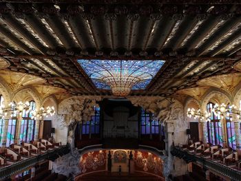 Low angle view of illuminated ceiling in building