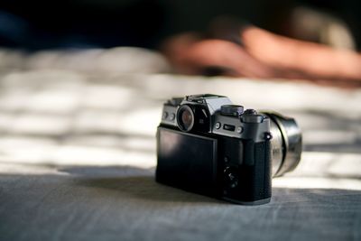Close-up of hand holding camera