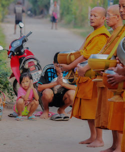 Children playing in traditional clothing