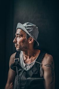 Portrait of young man looking away