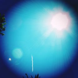 Low angle view of vapor trails in sky