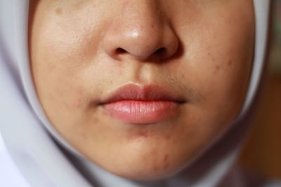 Close-up portrait of woman face wearing hijab