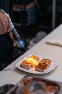 Midsection of woman having food