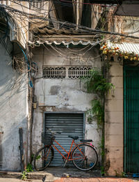 Bicycle parked outside building