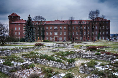 Buildings against sky during winter