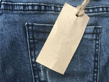 Close-up of price tag on jeans