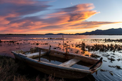 Great winter sunset on one of the many salt lakes near cagliari, sardinia