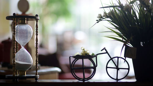 Close-up of clock on table