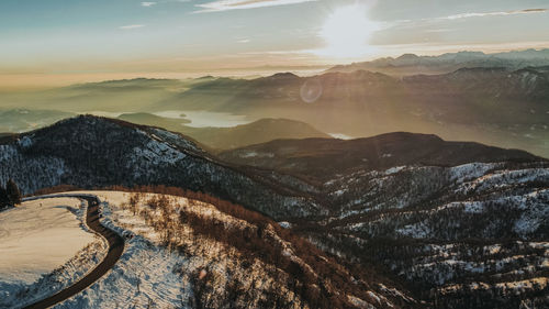 Scenic view of mountains against sky during sunset