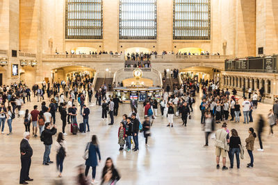 Group of people at railroad station
