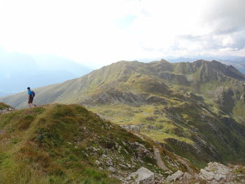 Tourists on mountain landscape