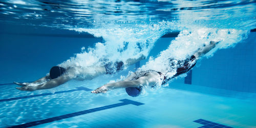 People swimming in pool