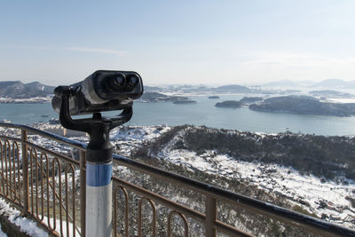 Scenic view of sea against sky during winter