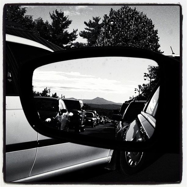 ROAD SEEN THROUGH CAR WINDSHIELD