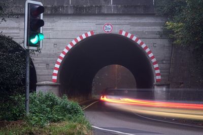 Light trails on road in tunnel