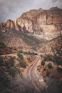 A road between mountains in zion national park, utah