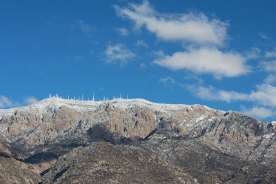 Low angle view of rock formation against sky