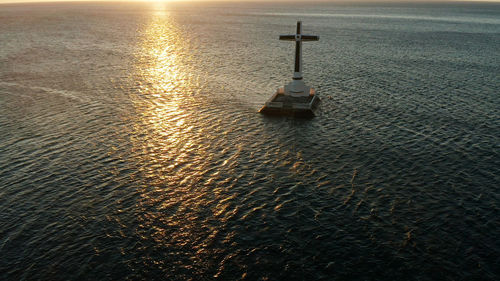 High angle view of sea against sky during sunset